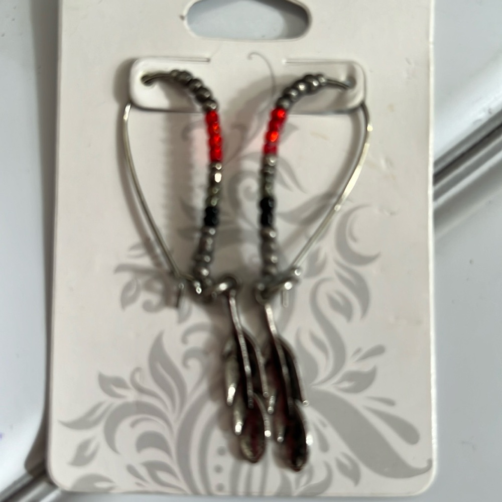 Hand made Earrings by Creek Native feather dangle